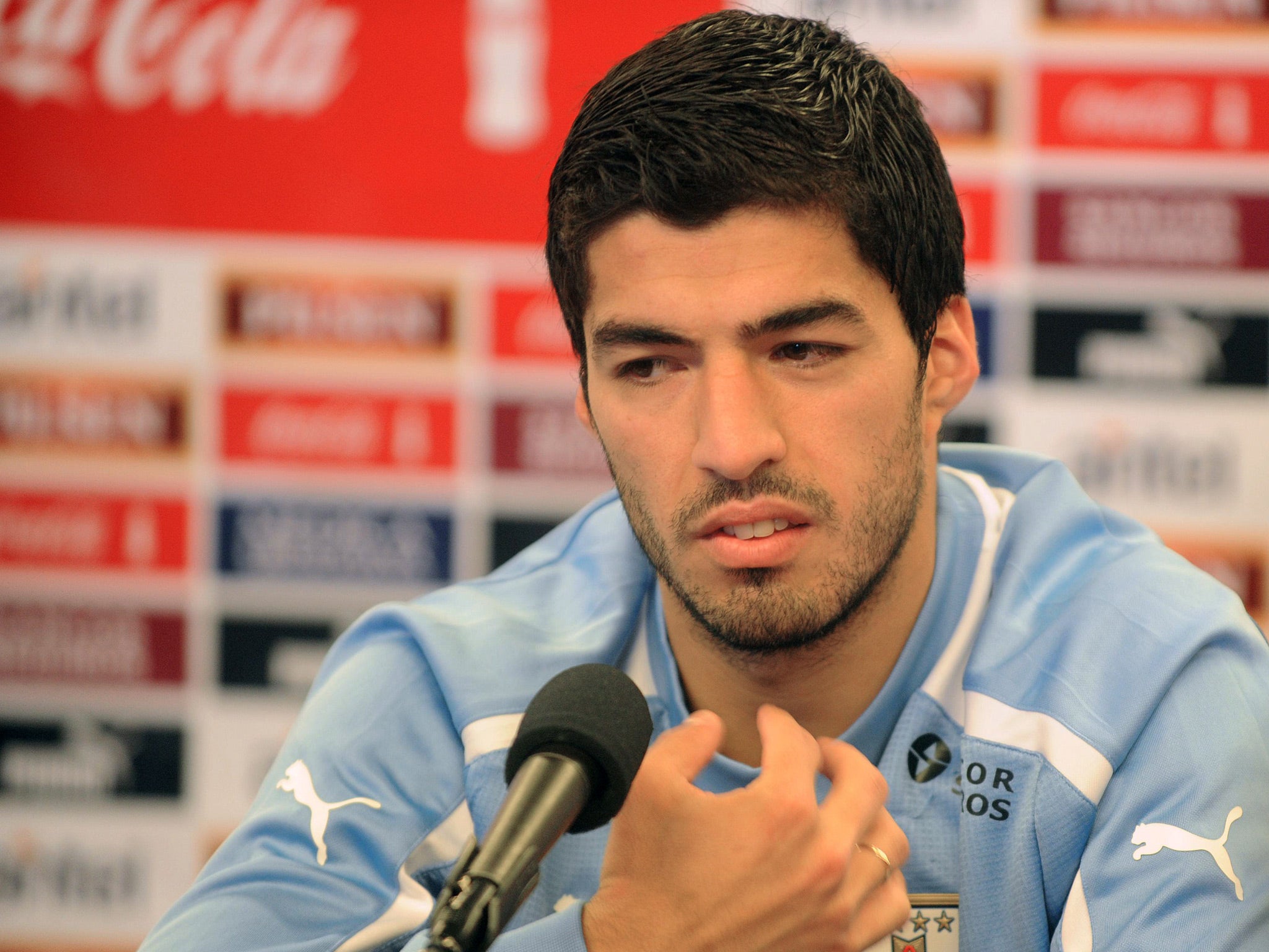May 2013: After days of hints over an exit, during a press conference in Uruguay Suarez confirms he wishes to leave Liverpool, blaming press intrusion for he desire to go.