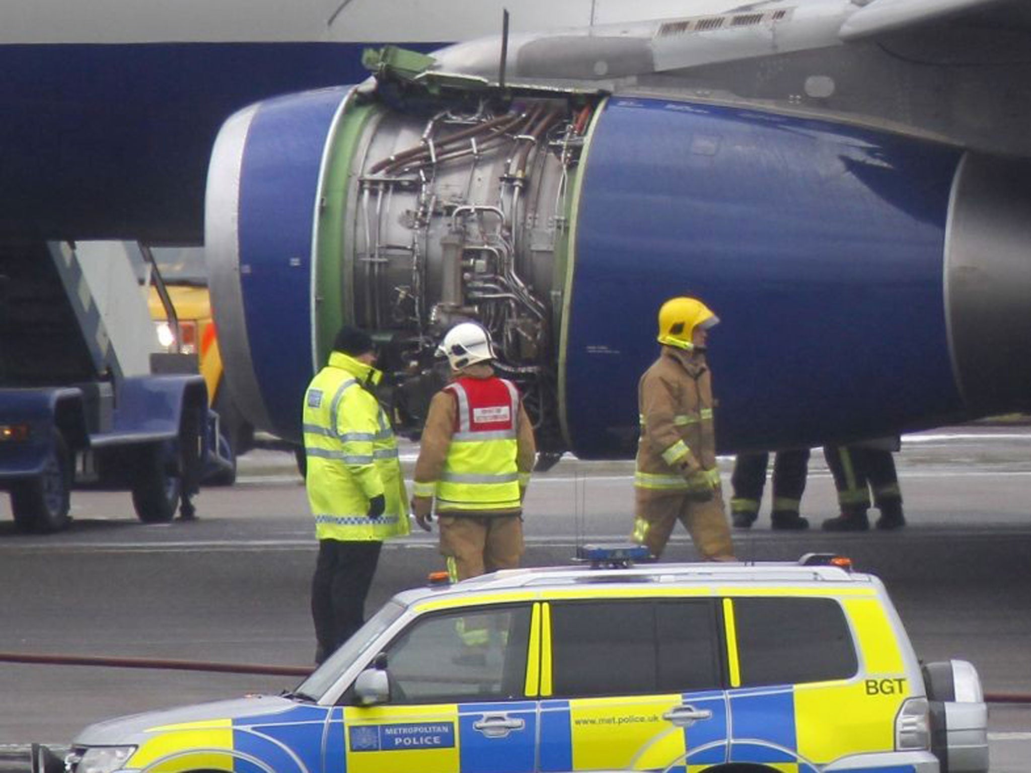 A British Airways flight BA762 surrounded by emergency vehicles after an emergency landing at Heathrow airport