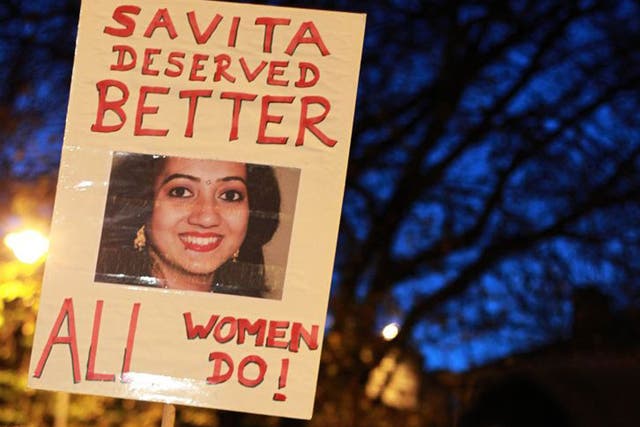 A protester outside the Irish parliament remembers Savita Halappanavar, who died after being refused an abortion 