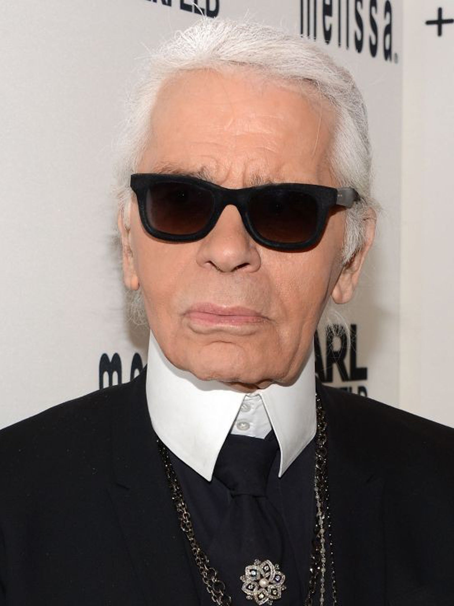 Karl Lagerfeld is known for employing staff that other people might deem superfluous