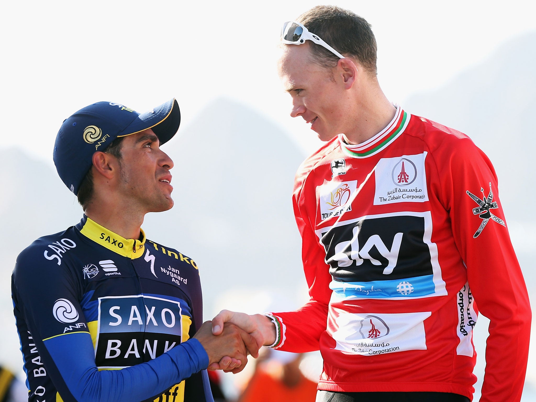 Spain's Alberto Contador shakes hands with Chris Froome (right)