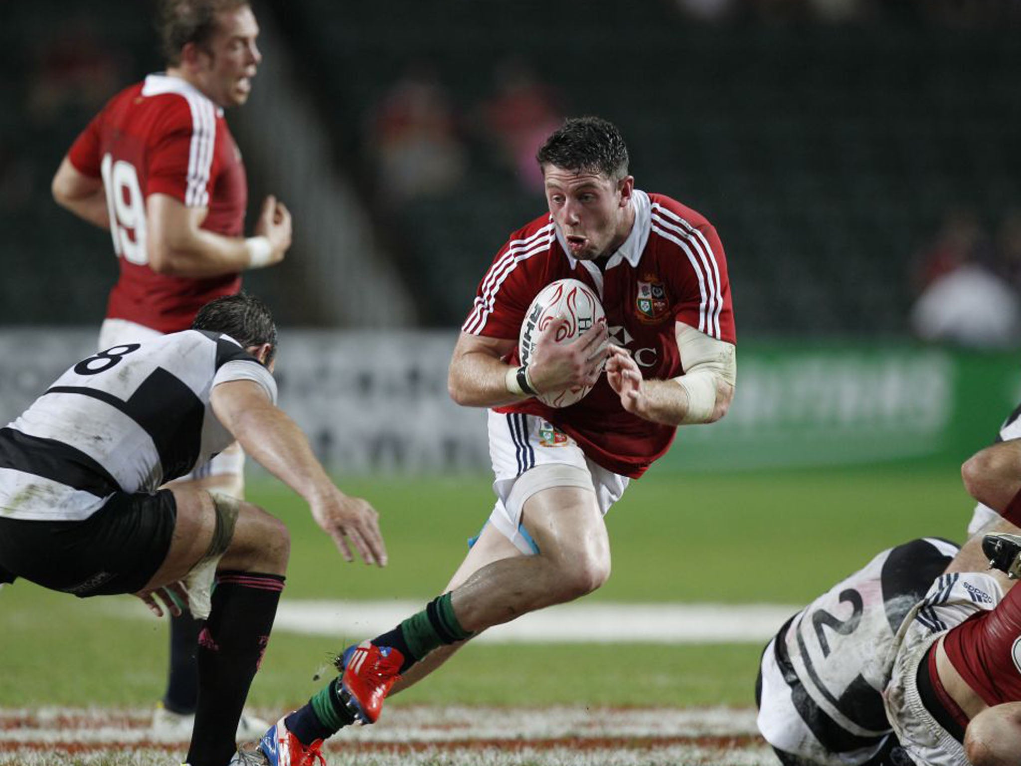 Alex Cuthburt evades a tackle during the the game