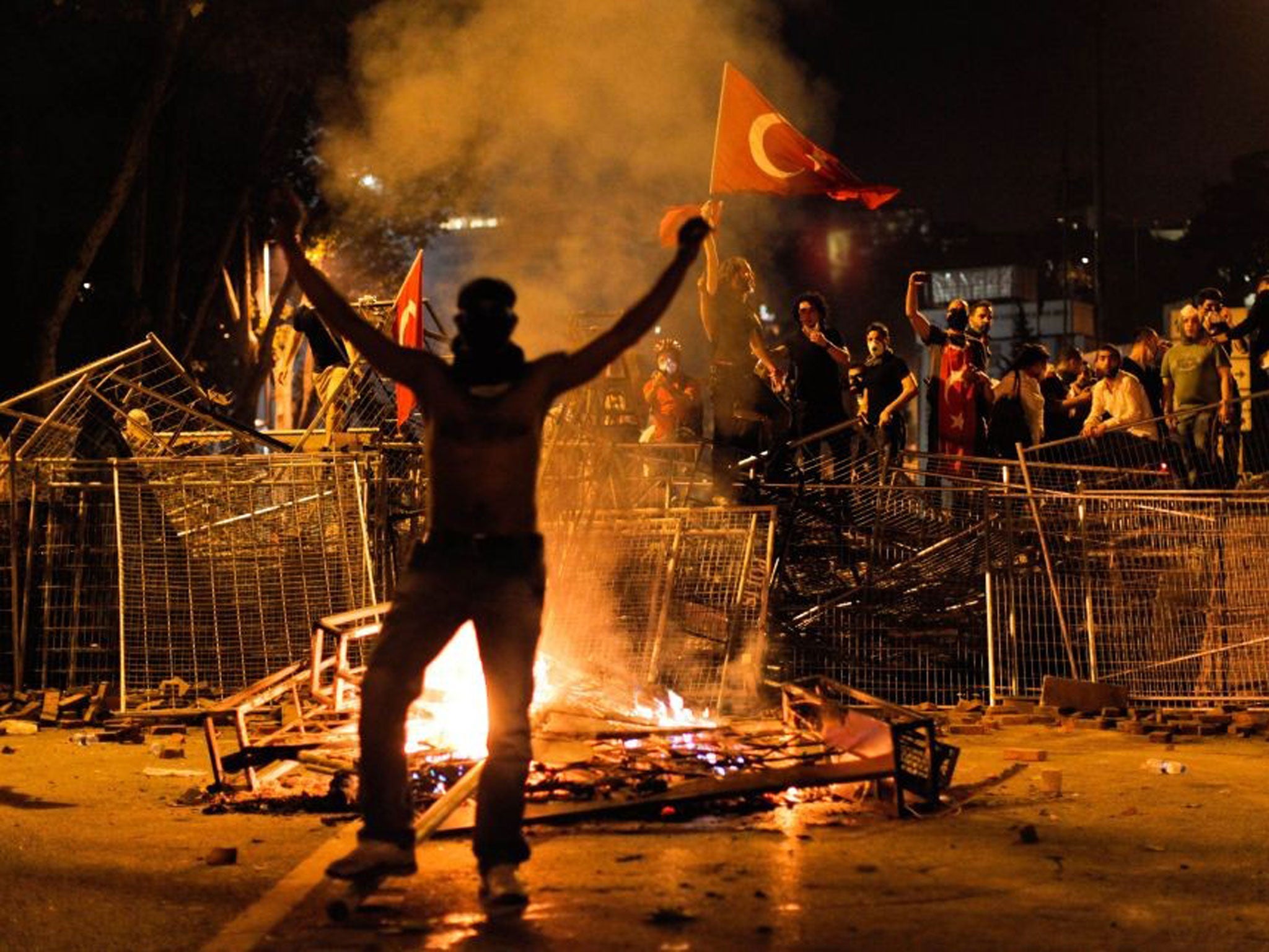 Protestors clash with riot police between Taksim and Besiktas in Istanbul,