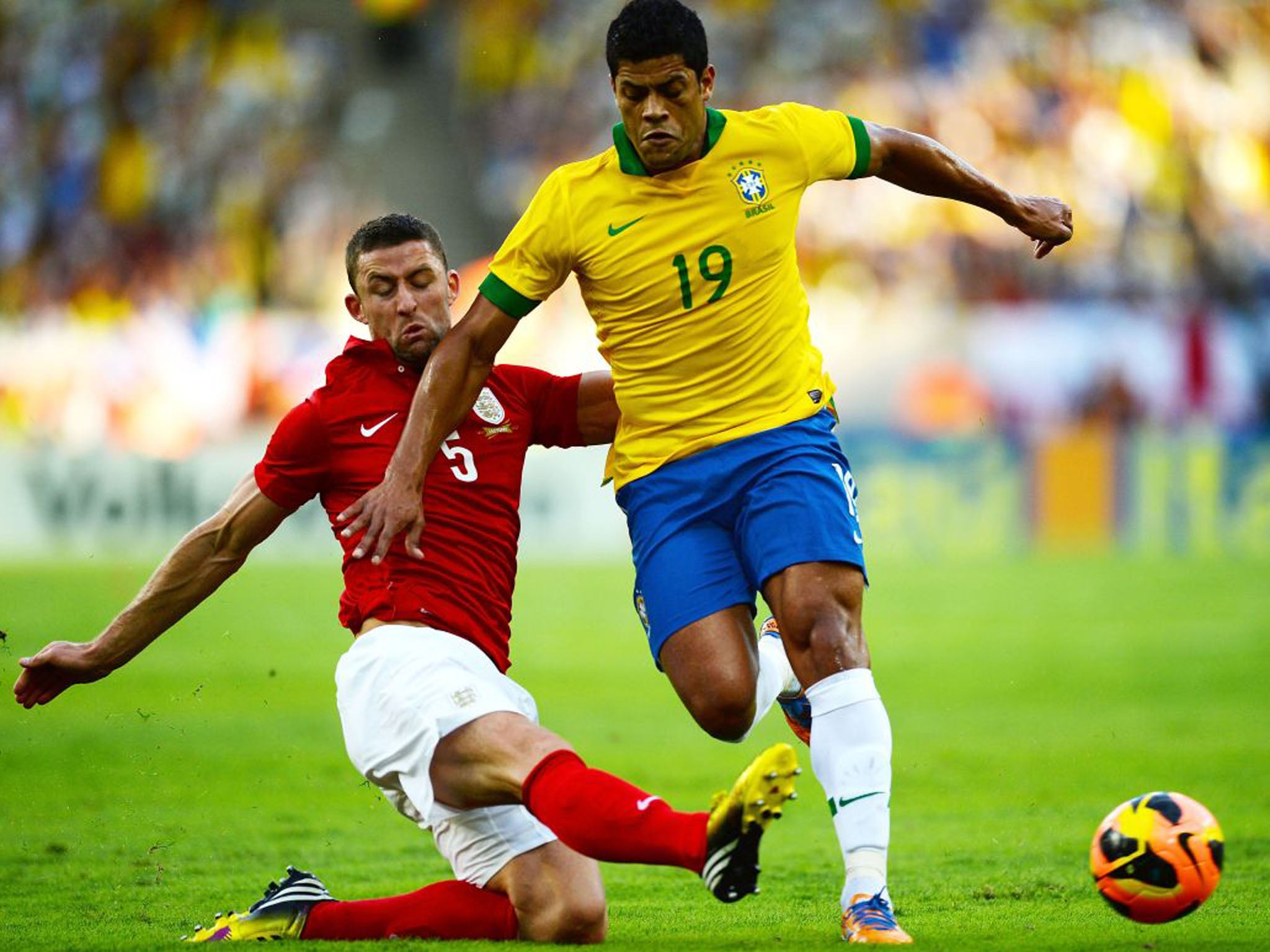 Gary Cahill battles with Hulk of Brazil. The central defender faced a tough night with the movement of Brazil's front players