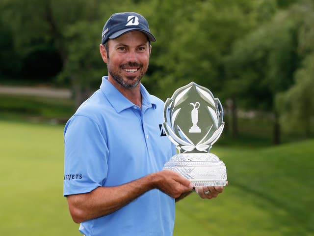 Matt Kuchar poses with the trophy afer his two-stroke victory at the Memorial Tournament presented by Nationwide Insurance at Muirfield Village Golf Club 