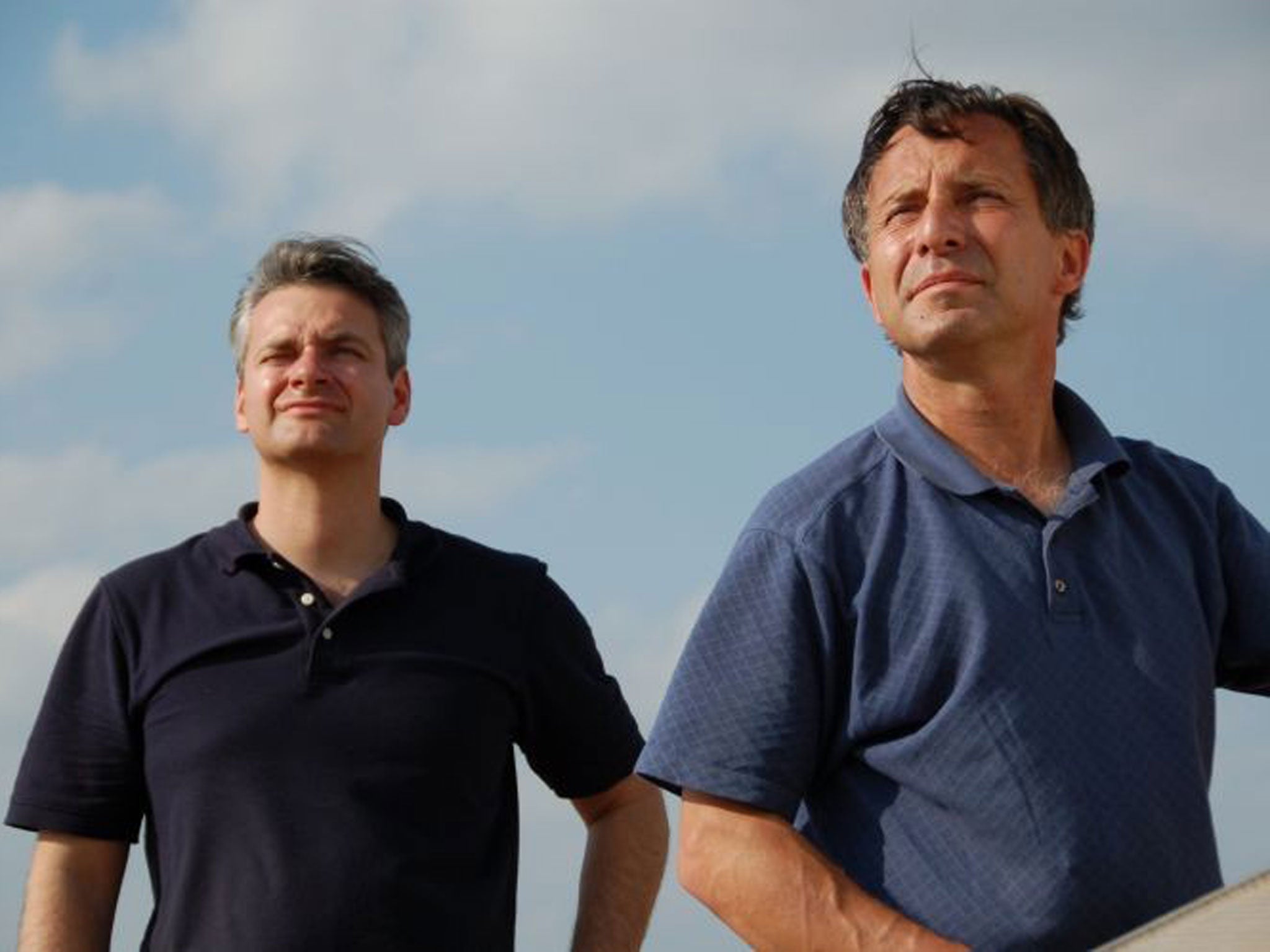 Carl Young and Tim Samaras watching the sky.
