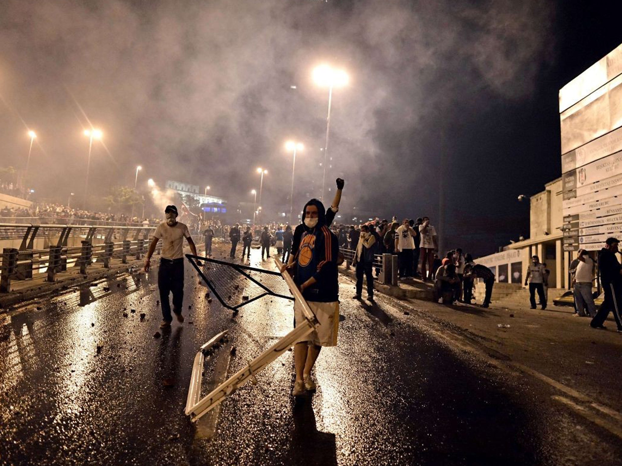 Demonstrators clash with riot police between Taksim and Besiktas in Istanbul