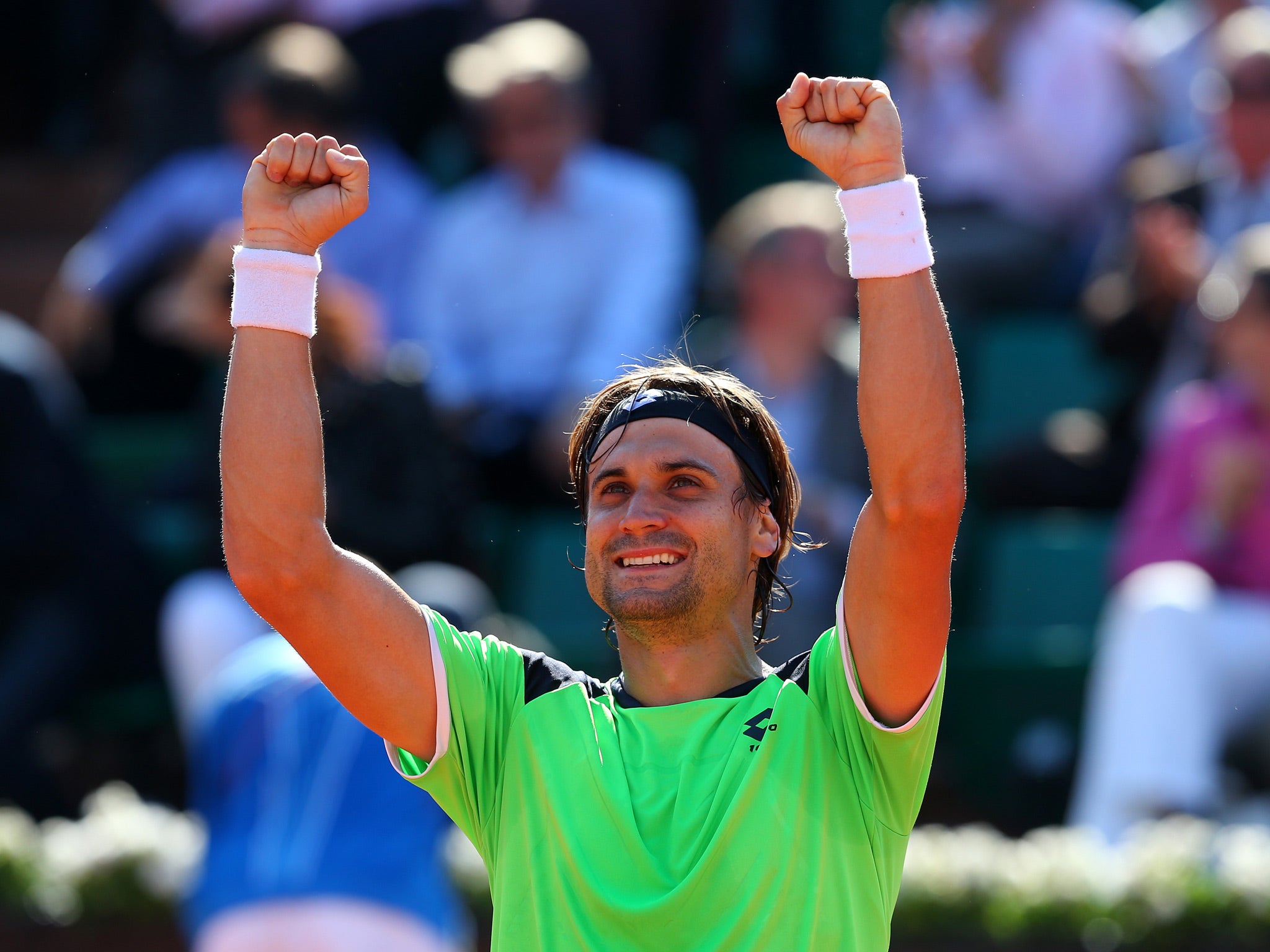 David Ferrer celebrates reaching the semi-finals at the French Open