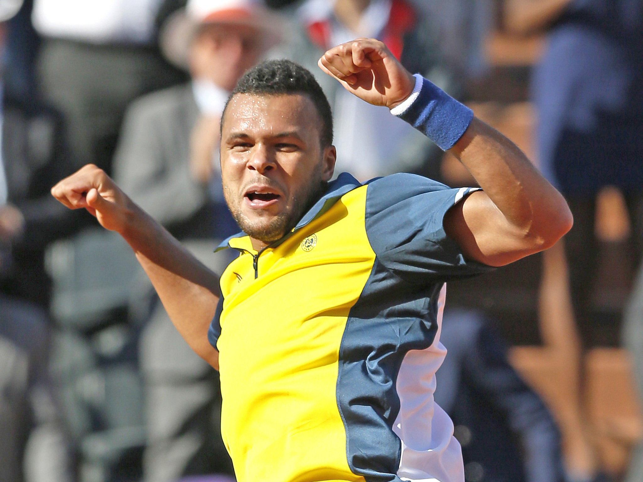 Jo-Wilfried Tsonga enjoys the moment of victory yesterday