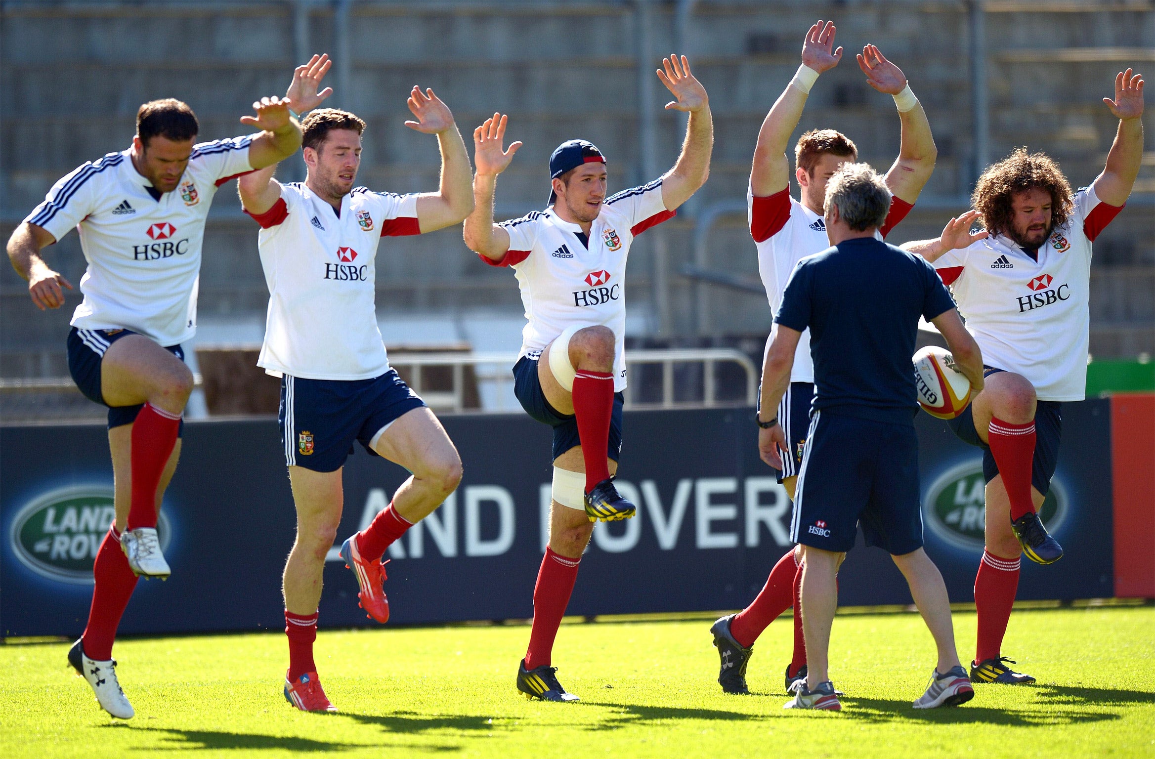 Lions players are put through their paces during the captain’s run in Perth