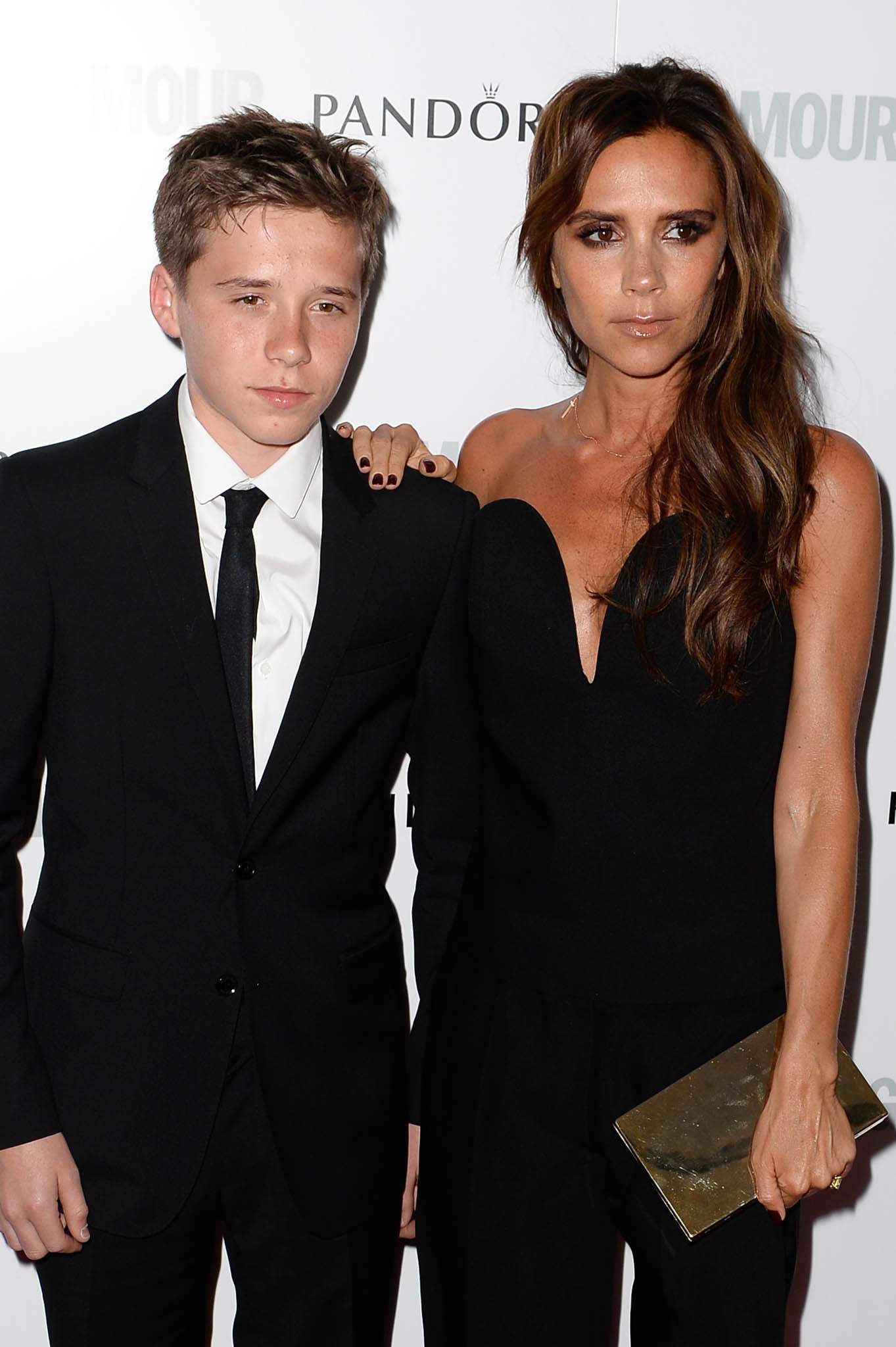 Brooklyn Beckham and Victoria Beckham attend Glamour Women of the Year Awards 2013