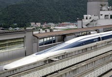 First passengers on Japanese maglev train travel at speeds of 311 mph