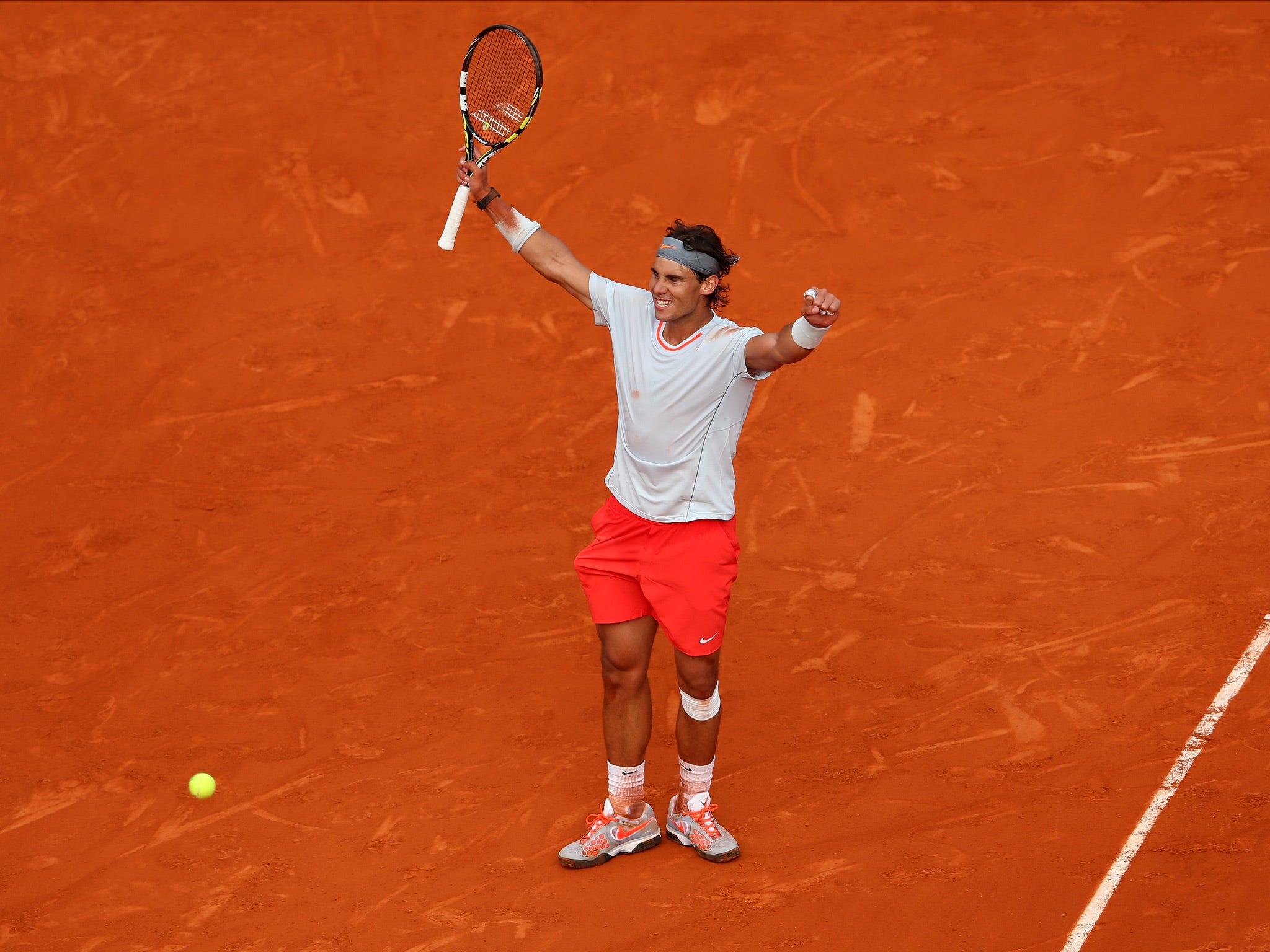 Rafael Nadal celebrates after reaching the semi-finals of the French Open