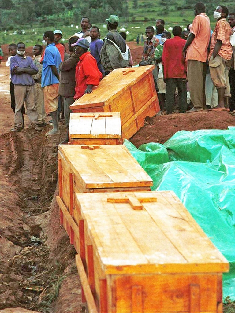 Coffins containing remains from a mass grave in Nyamirambo, Rwanda