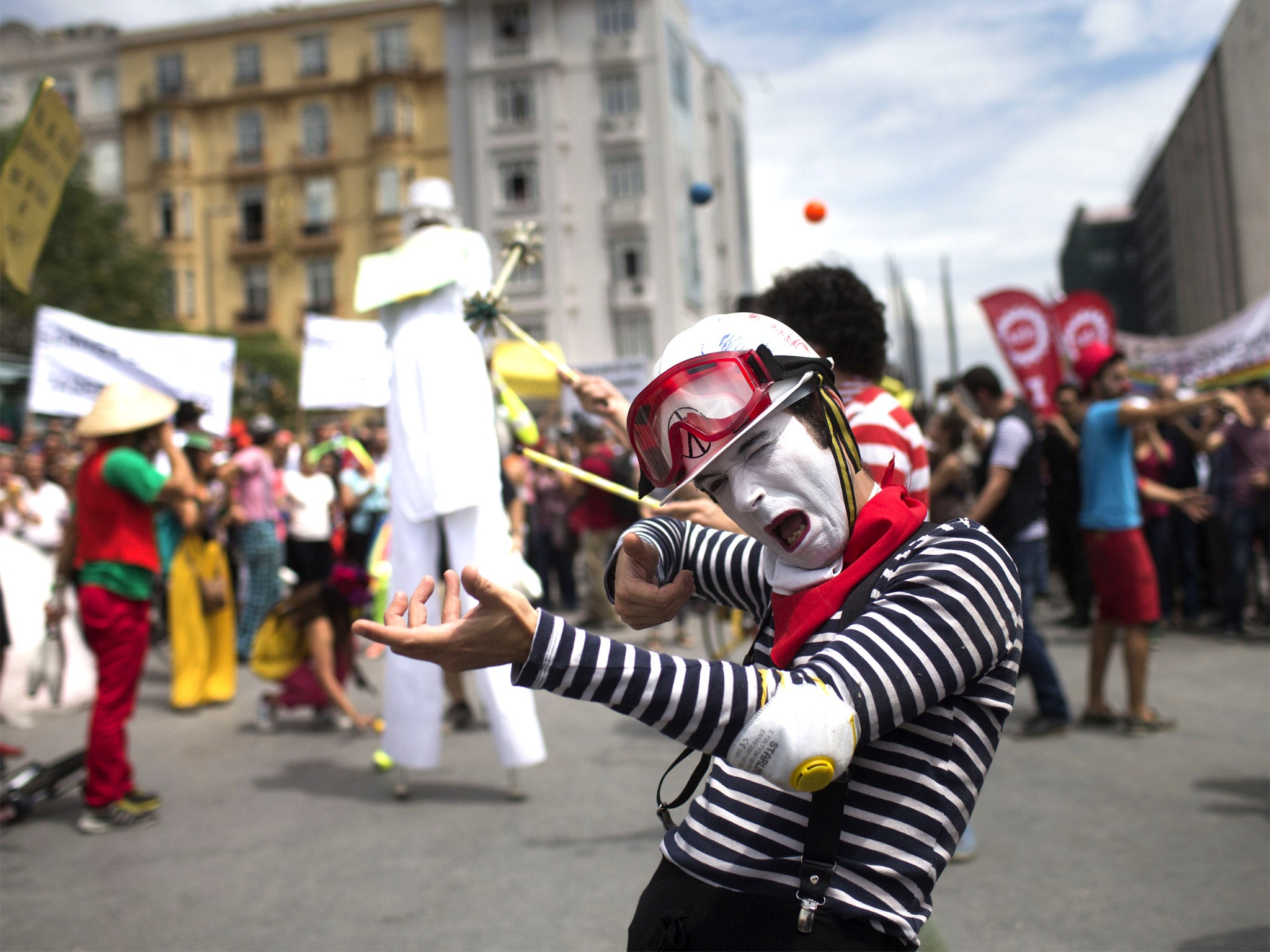 Mime artists perform in support of the protesters in Istanbul yesterday