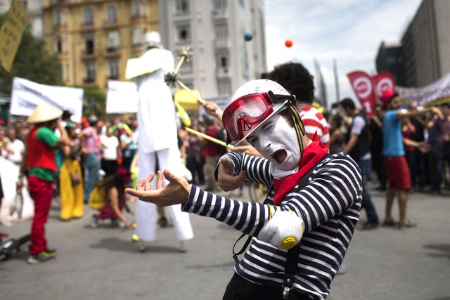 Mime artists perform in support of the protesters in Istanbul yesterday