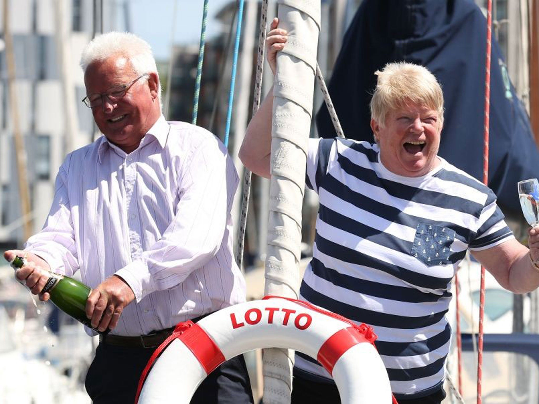 Cathy and Richard Brown, from Ipswich, celebrate winning £6,123,395 lotto jackpot aboard their boat BRAVE