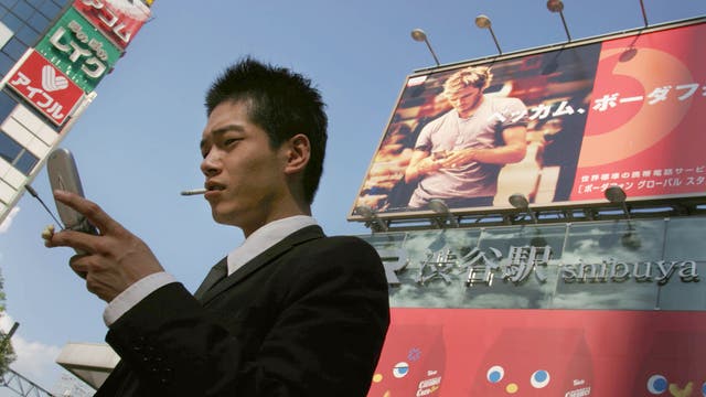 Football favourite: A David Beckham advert in Tokyo