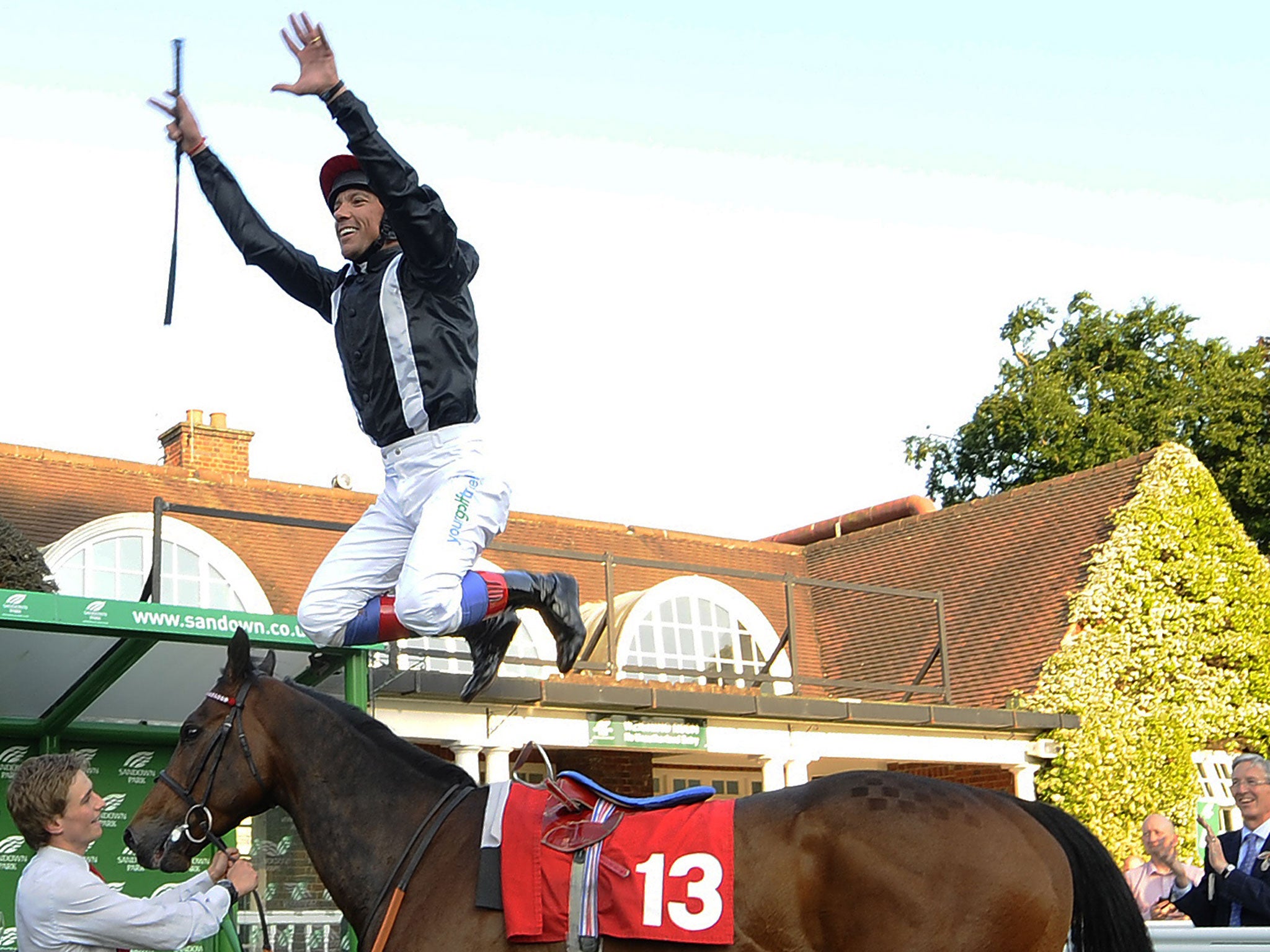 Frankie Dettori dismounts from Asian Trader in trademark style