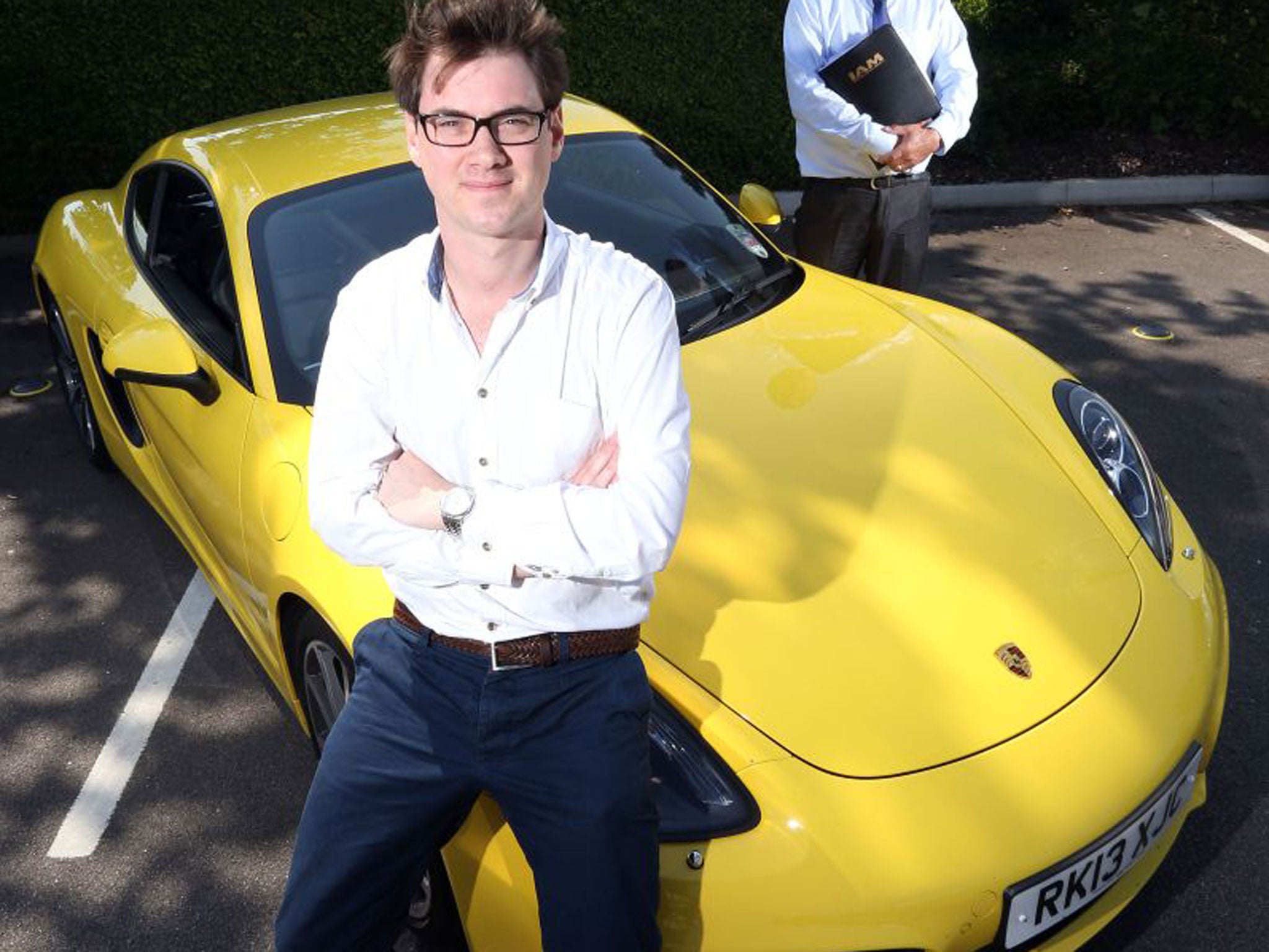 Jamie Merrill and the Porsche Cayman in which he was assessed on his safe driving