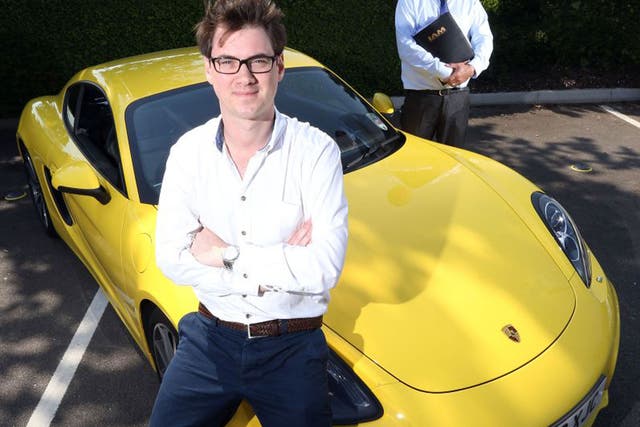 Jamie Merrill and the Porsche Cayman in which he was assessed on his safe driving 