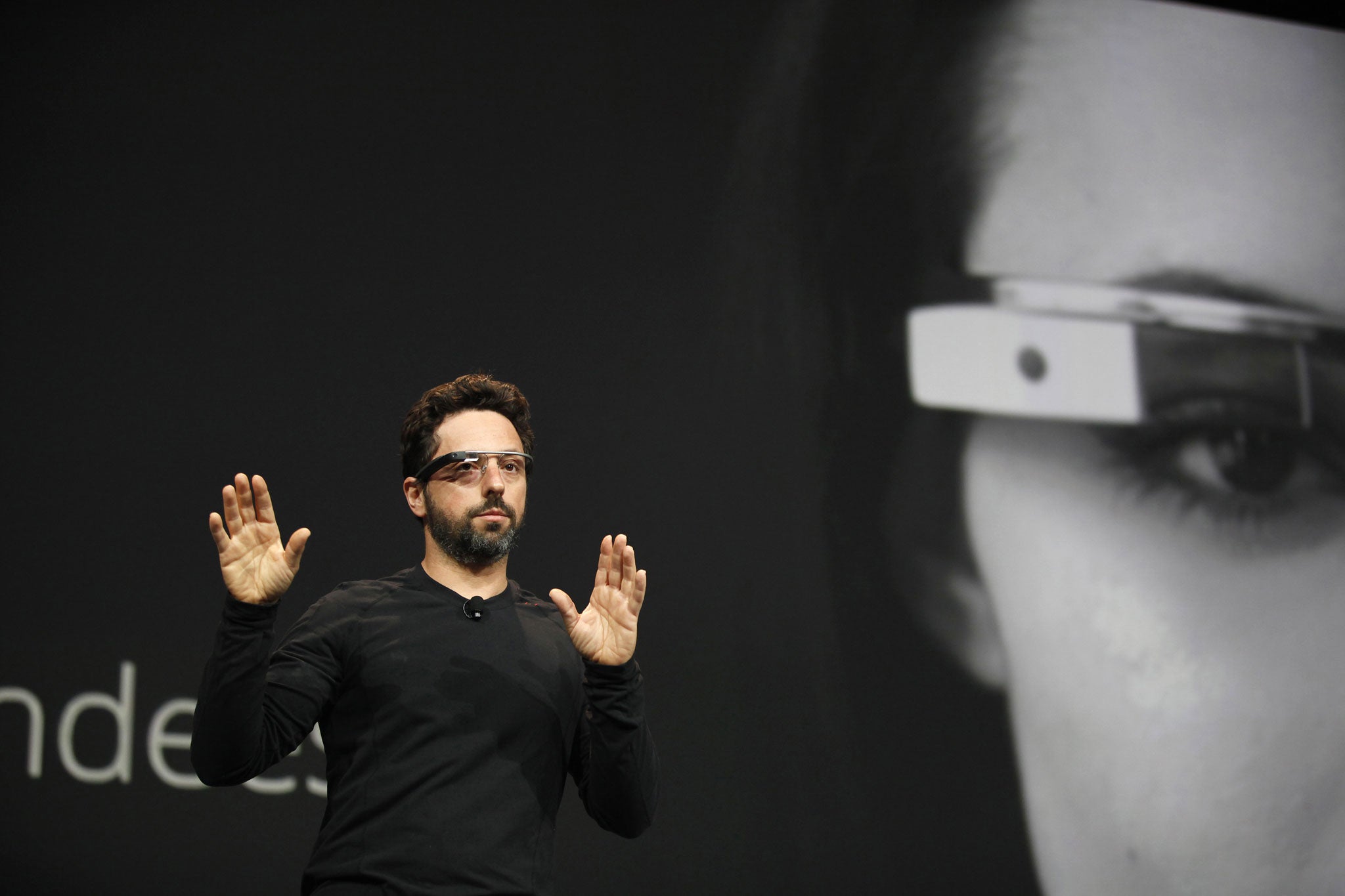Sergey Brin, CEO and co-founder of Google, wears a Google Glass during a product demonstration during Google I/O 2012.