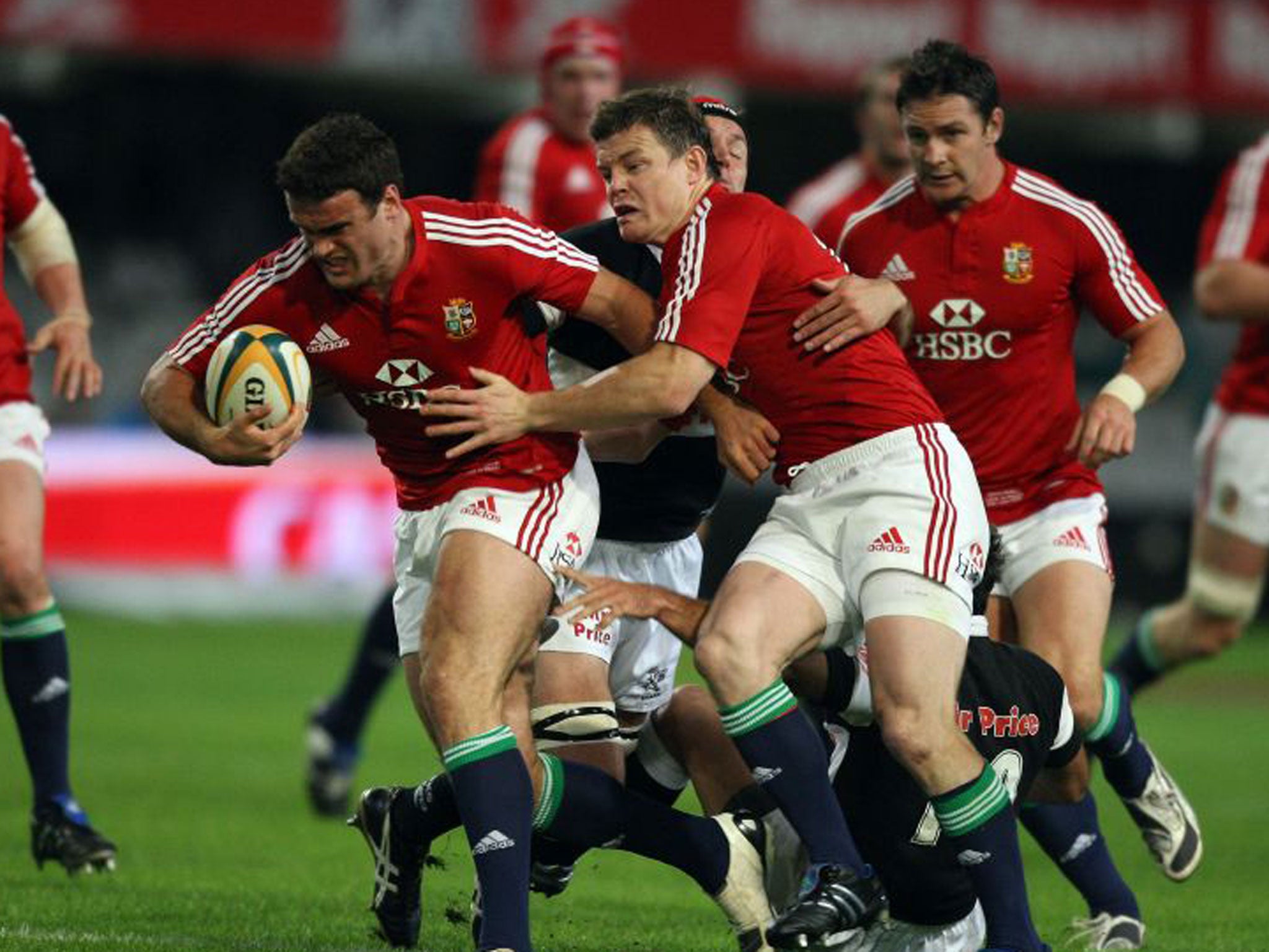 Charging upfield with Brian O’Driscoll in support on the 2009 Lions tour of South Africa