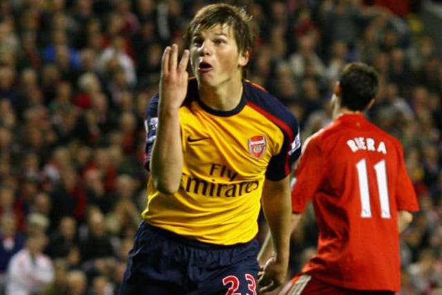 Arshavin celebrates the third of his four against Liverpool in 2009