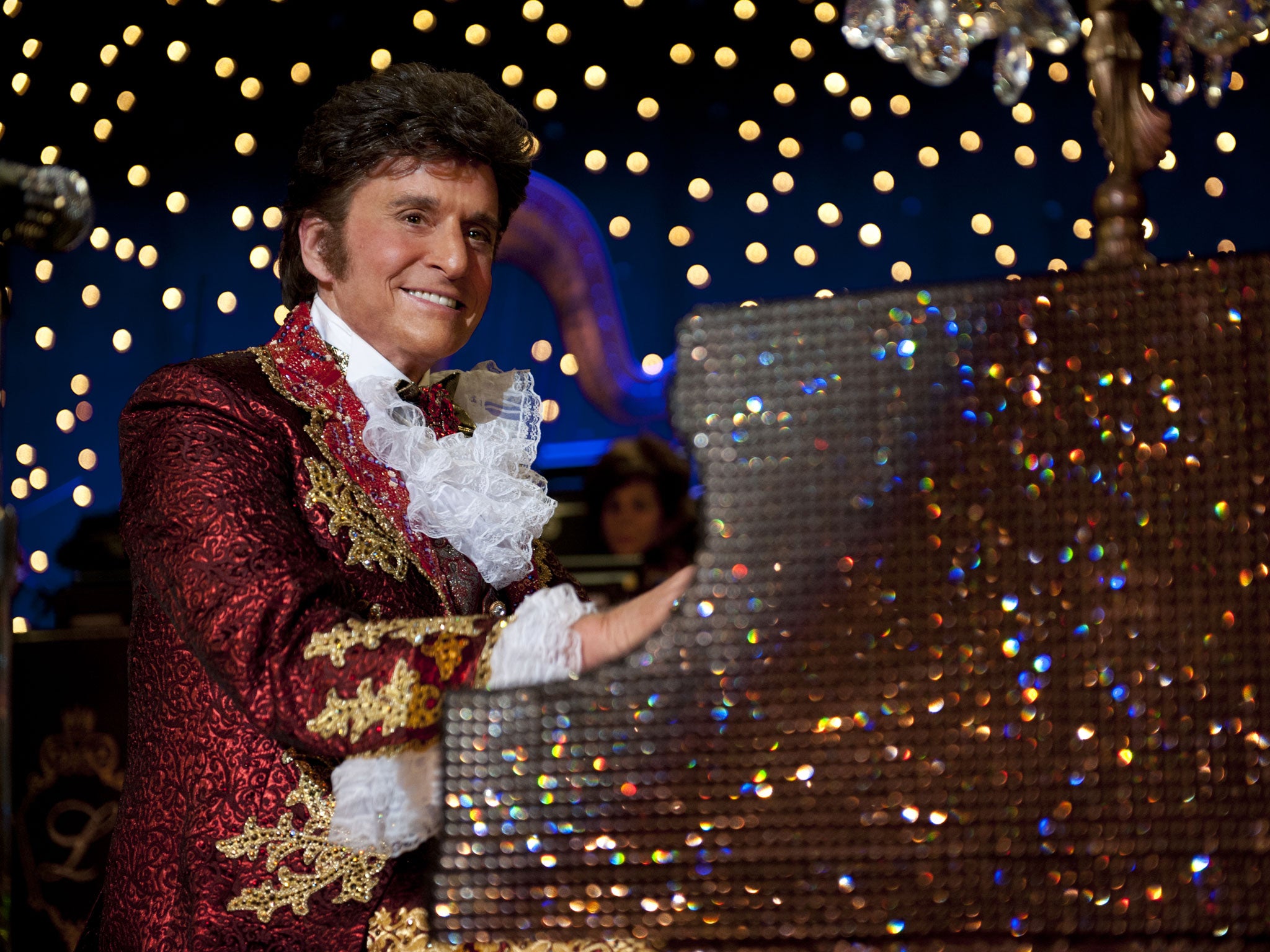 As Liberace, Douglas’s macho image falls away with one twinkle of an eyelid