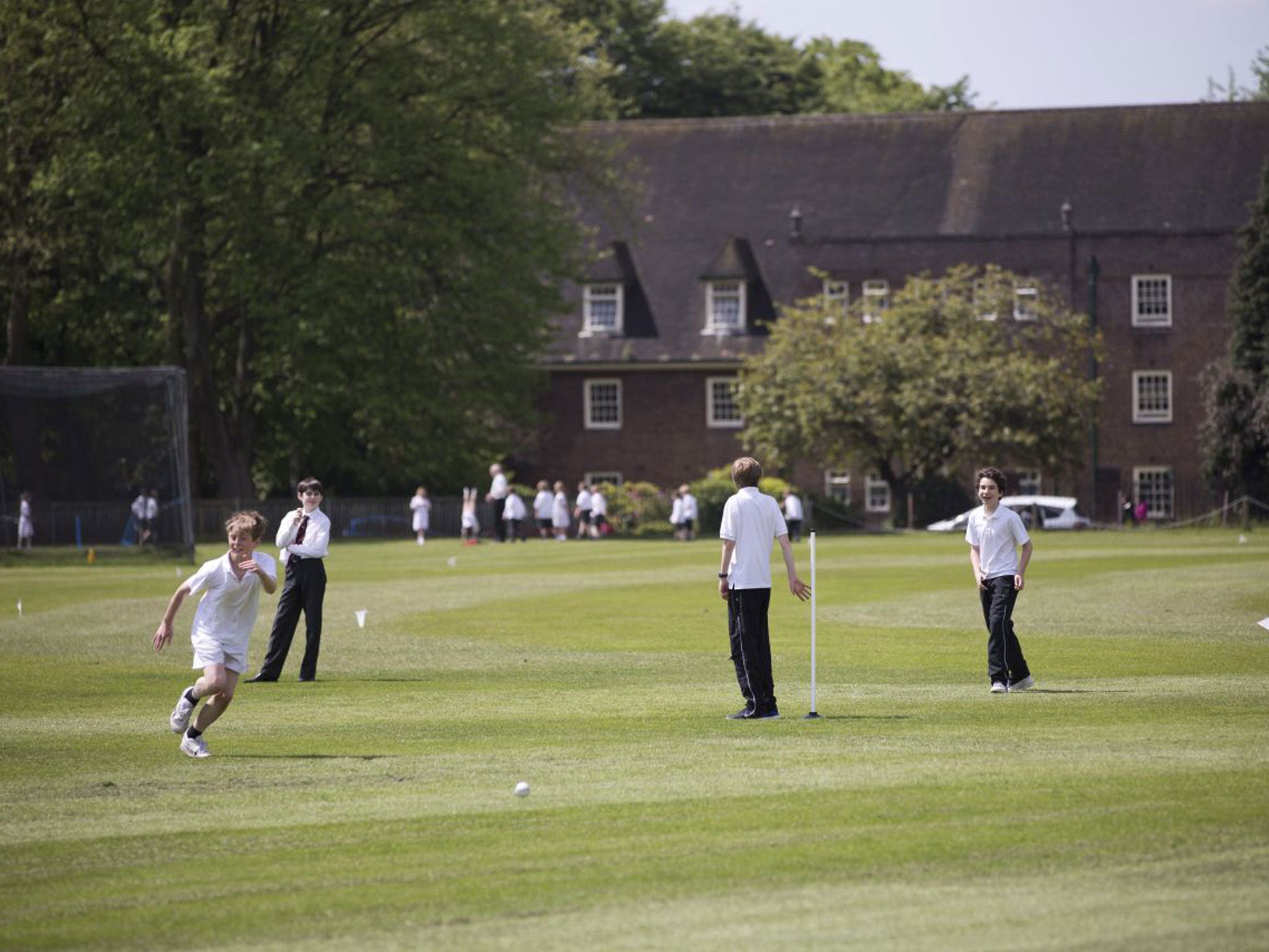 Liverpool College pupils playing rounders