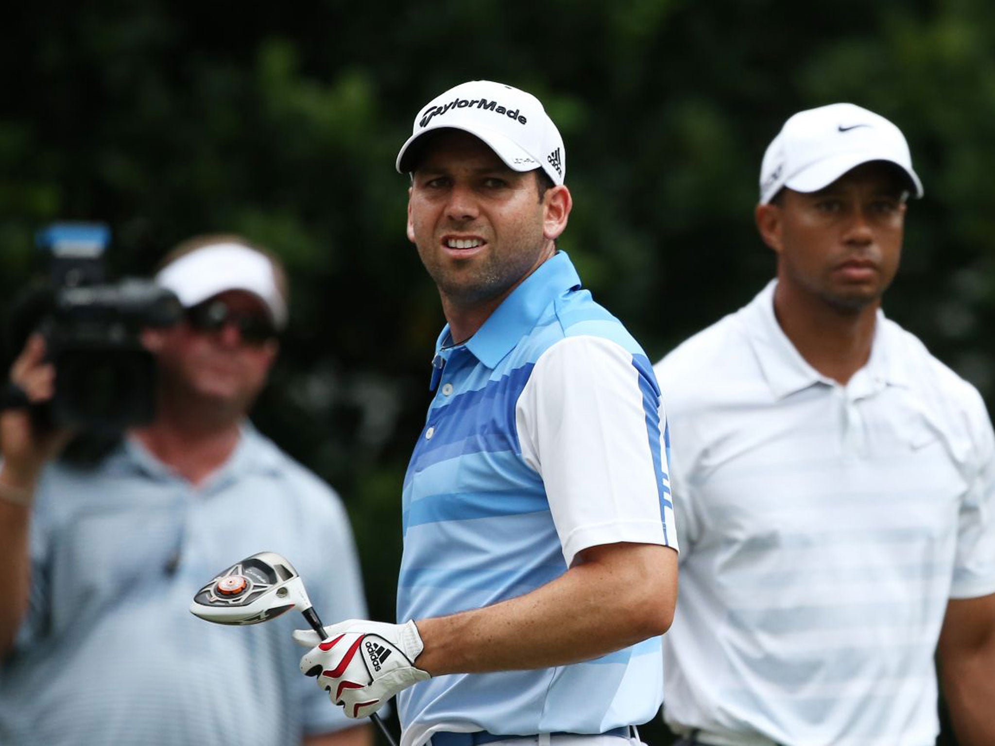 Sore point: Sergio Garcia (left) alongside Tiger Woods at the ill-fated Players Championship at Sawgrass last month