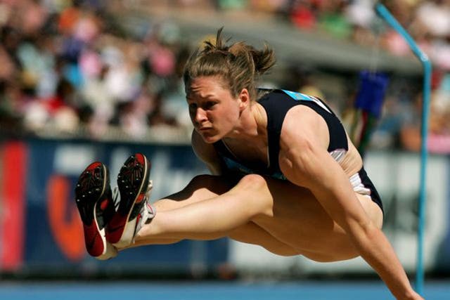 Feet first: Gillian Cooke competes in the long jump for Scotland at the 2006 Commonwealth Games in Melbourne