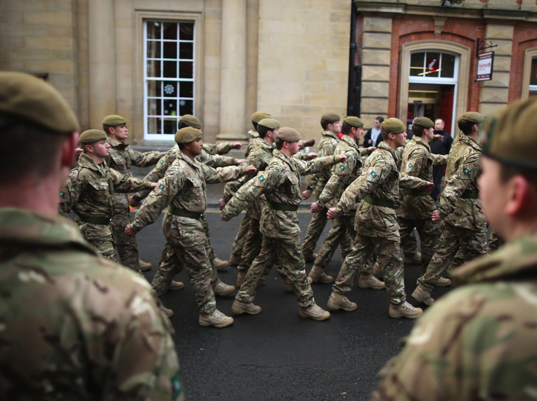 Soldiers from 3rd Battalion The Yorkshire Regiment march through the streets of York during a homecoming parade on December 5, 2012 in York, England.