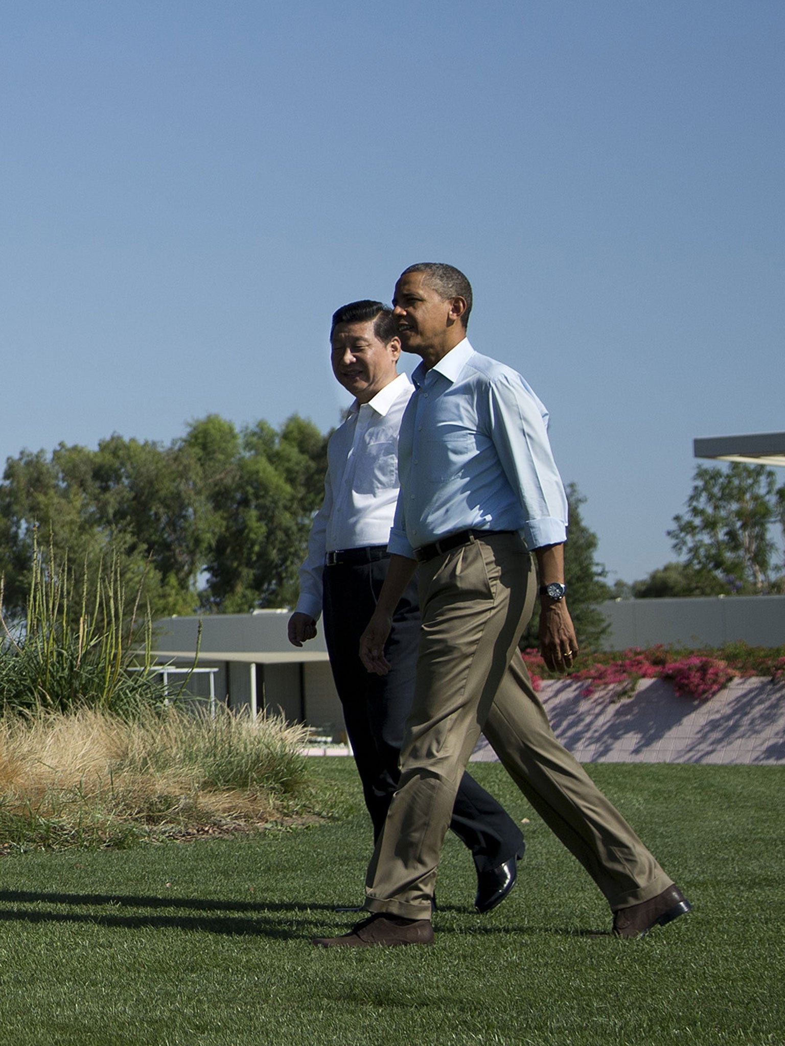 The Chinese President Xi Jinping, left, with President Obama, right