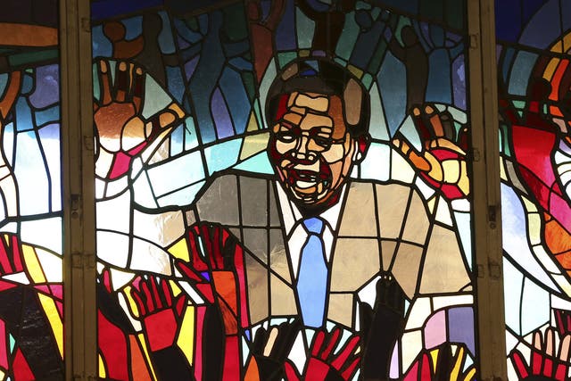 A mural of former South African president Nelson Mandela is seen at Regina Mundi church in Soweto