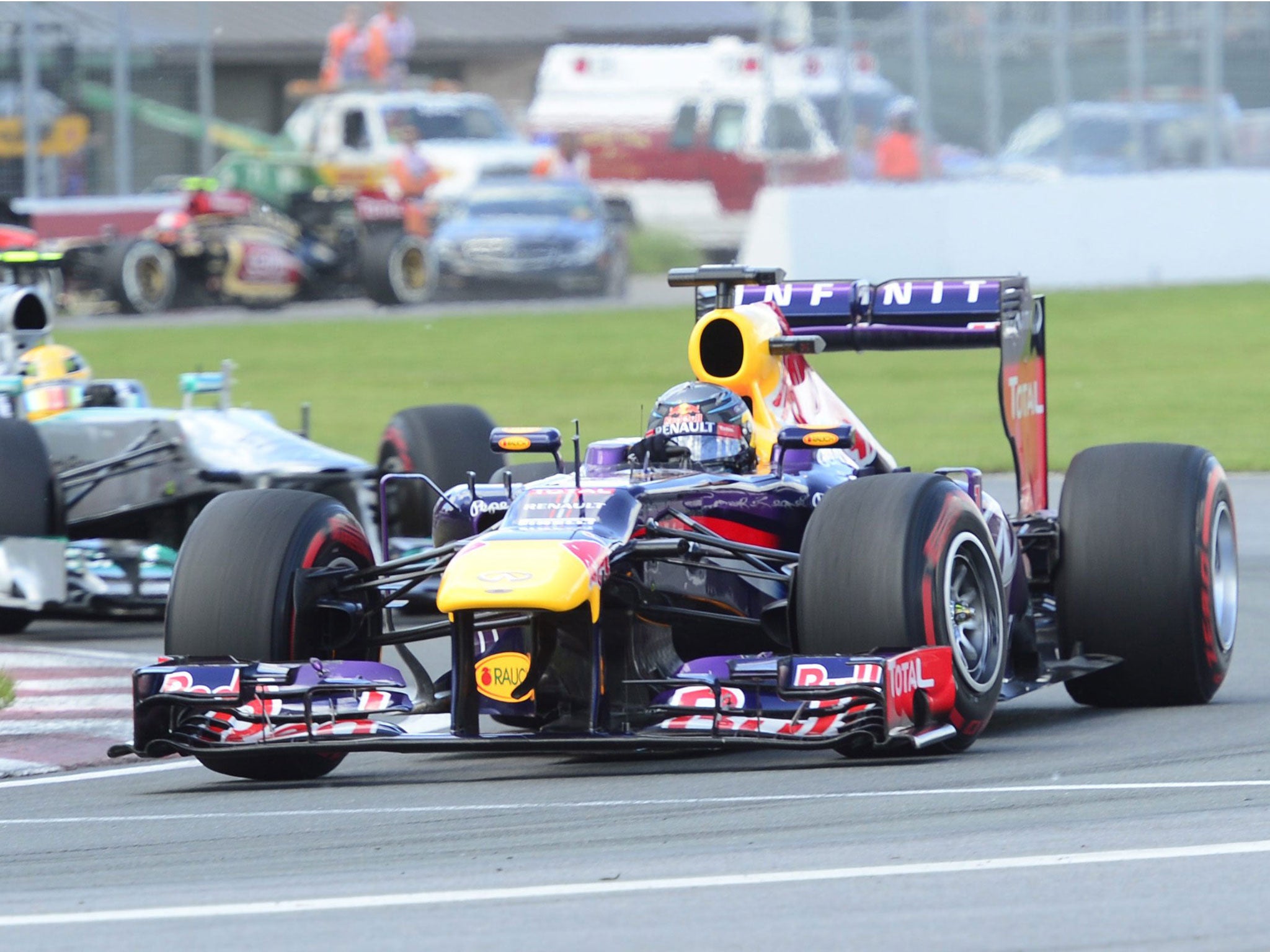 Red Bull’s Sebastian Vettel leads Mercedes’ Lewis Hamilton in Montreal