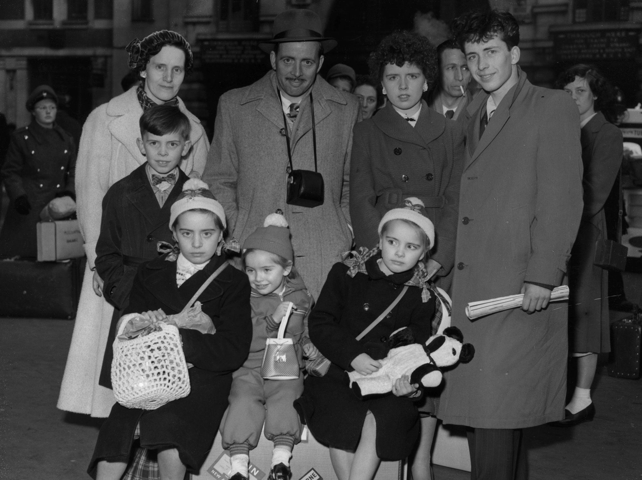 20th April 1955: The Igoe family from Edinburgh waiting for their train at London's Waterloo Station, en route to a new life in Melbourne. They are amongst the 2,600 British citizens who are being given aid to emigrate to Australia in the next two days.