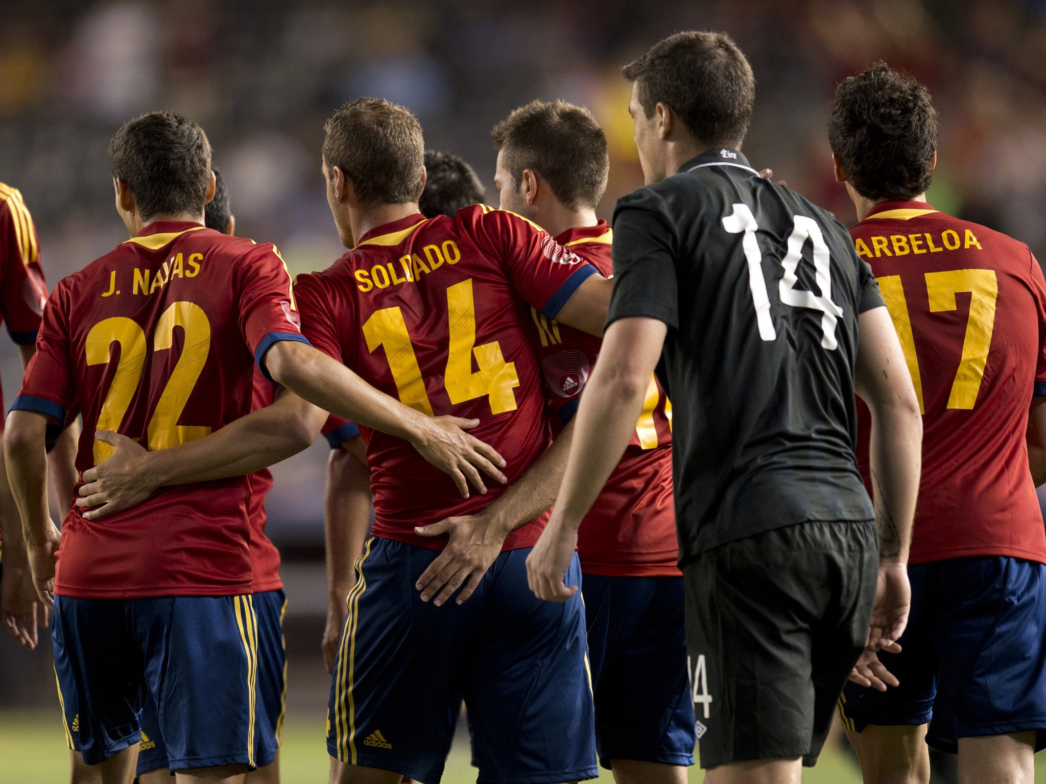 Spain's Roberto Soldado (14) is congratulated by teammates after scoring against Ireland during their friendly match June 11, 2013 at Yankee Stadium in New York
