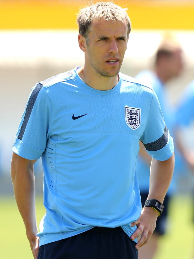 Phil Neville was part of the England under-21s coaching staff in Israel