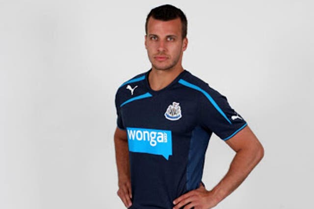Newcastle's away kit, with its controversial sponsor, appears to be of slick design 