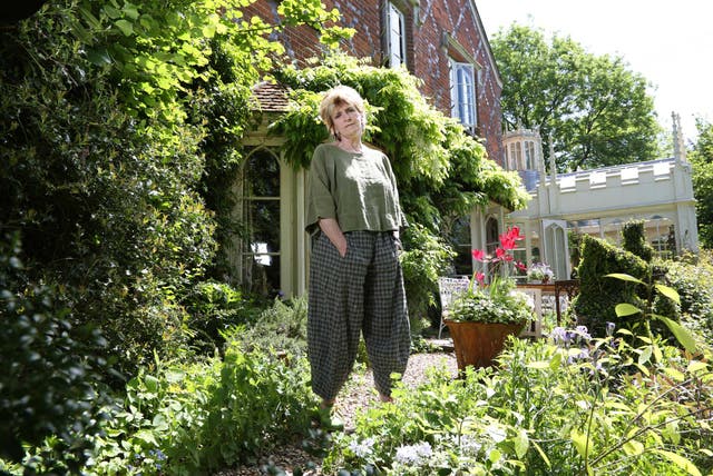 Lady Lucinda Lambton outside her home in Buckinghamshire. She says: 'Gender discrimination - they are two words I would never dream of using but there is no other way to describe it.'