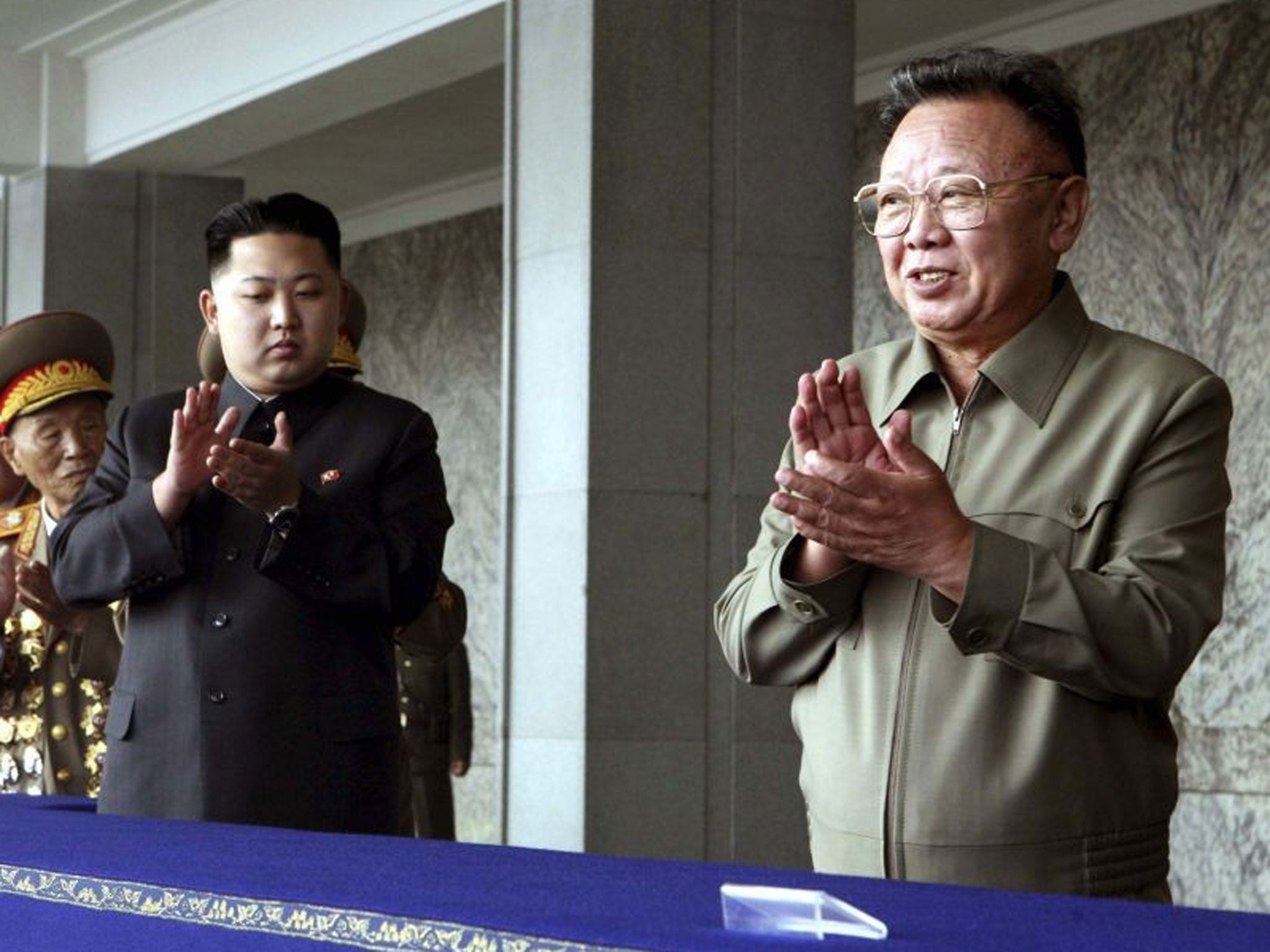 Kim Jong-il pictured next to his son and political heir Kim Jong-un