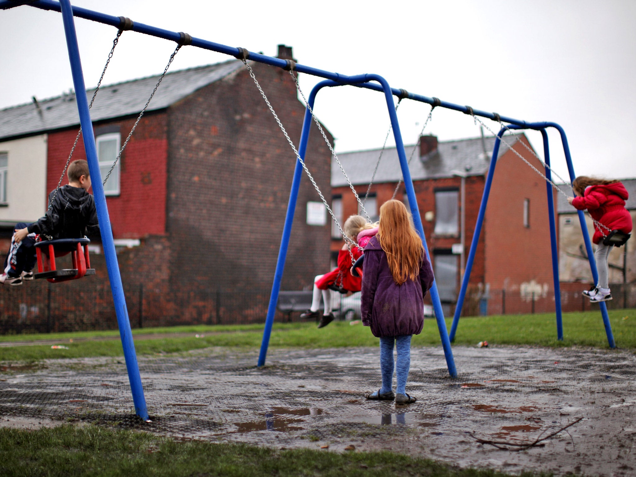 Children living below the poverty line are now twice as likely to come from working families struggling on low incomes and falling wages than those whose parents are unemployed, official figures have revealed