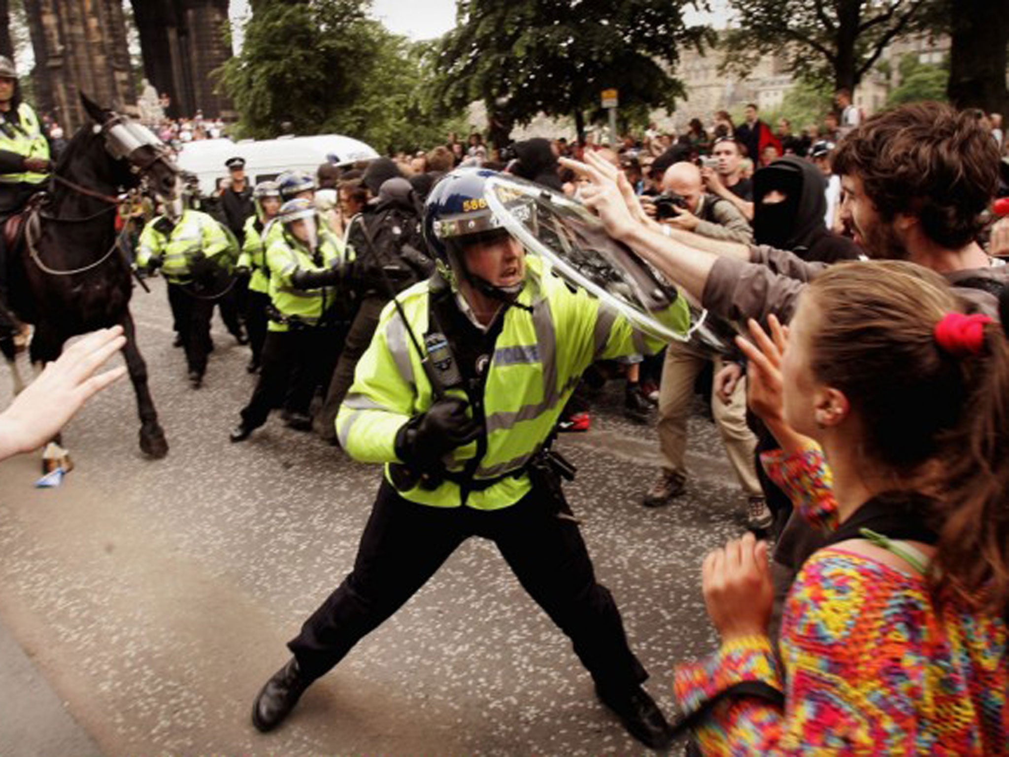 Police clash with protesters in Edinburgh on 4 July 2005 ahead of the Gleneagles summit