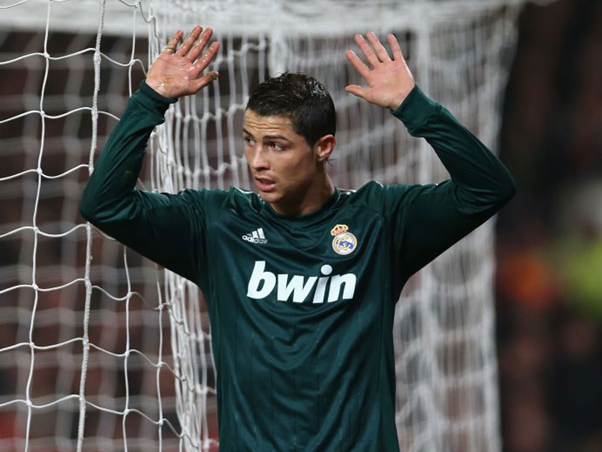 Ronaldo scores for Madrid at Old Trafford, but will not celebrate