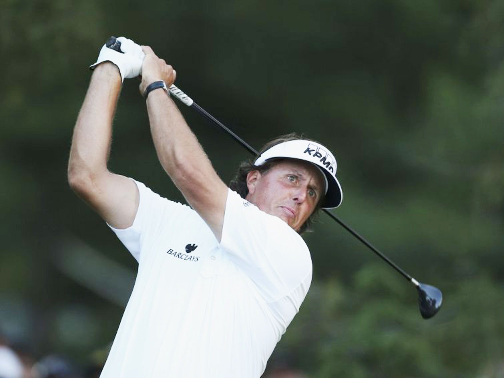 Phil Mickelson tees off on the 16th hole during the second round of the 2013 US Open golf championship at the Merion Golf Club