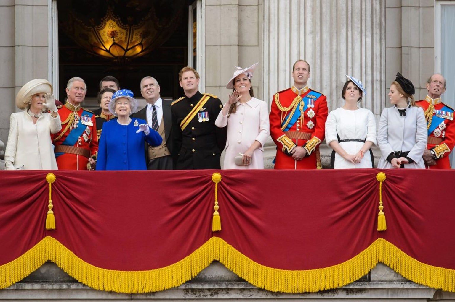 Left to right: The Duchess of Cornwall, the Prince of Wales, the Princess Royal, Queen Elizabeth II, the Duke of York, Prince Harry, the Duke and Duchess of Cambridge, Princess Eugenie, Princess Beatrice and the Duke of Kent, on the balcony of Buckingham Palace