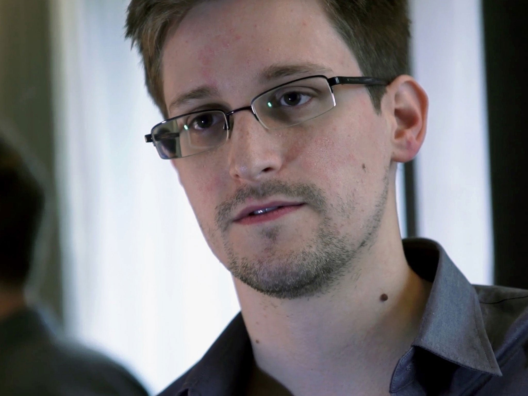 The Government is trying to prevent whistleblower Edward Snowden from travelling to this country