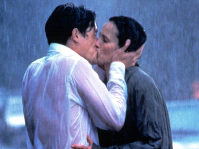 Hugh Grant kisses Andie MacDowell in Four Weddings and a Funeral