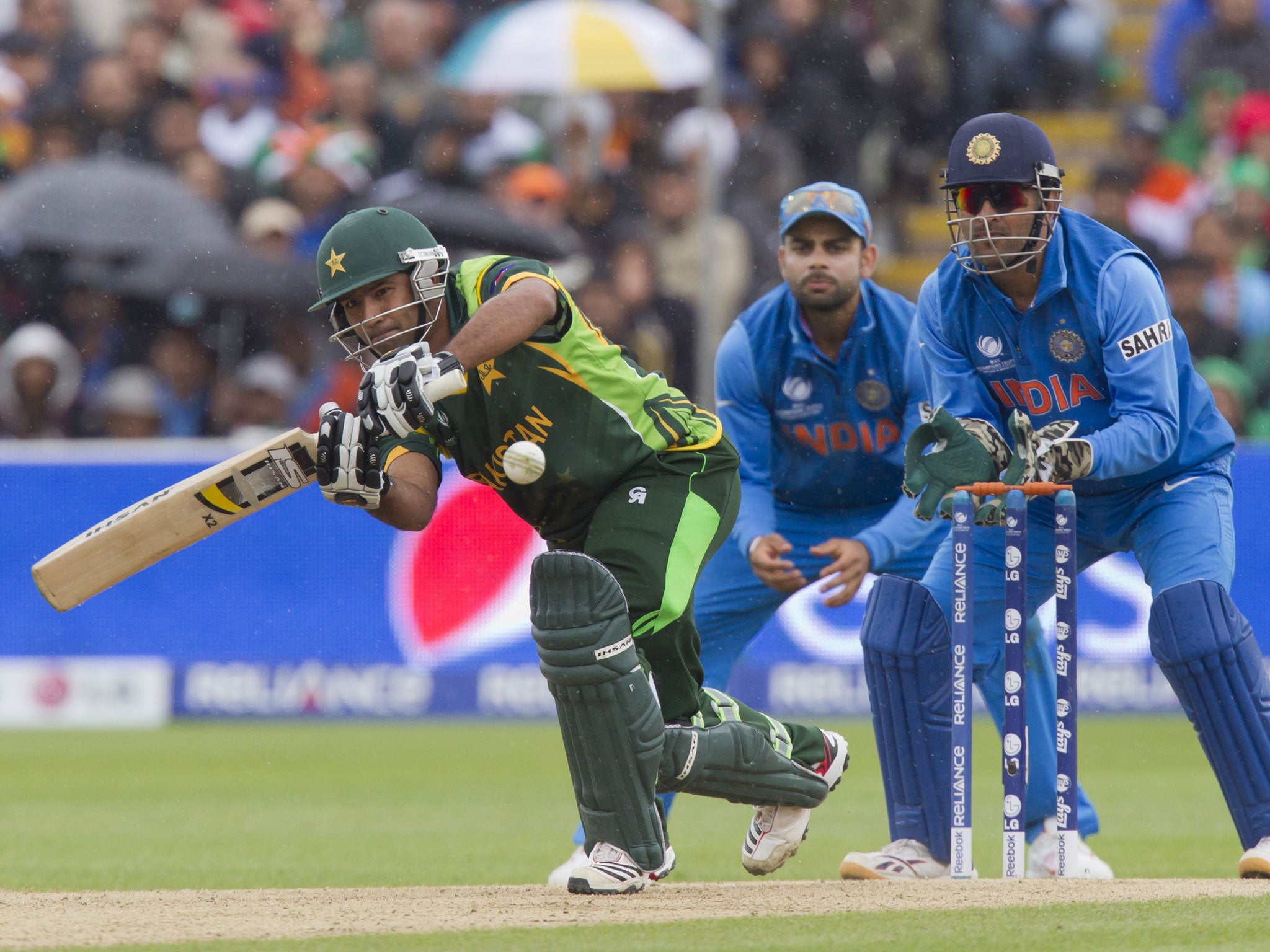 Hit and miss: Asad Shafiq turns the ball to midwicket